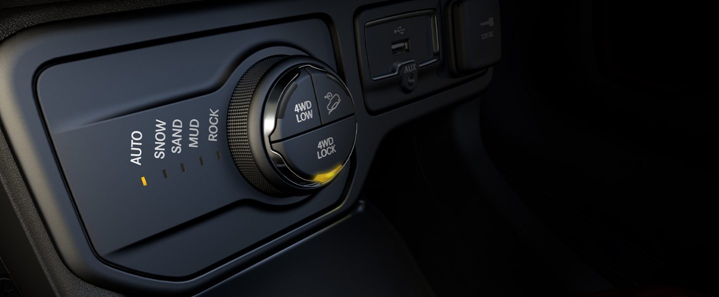 A close-up of the Selec-Terrain controls available on the 2020 Jeep Renegade.