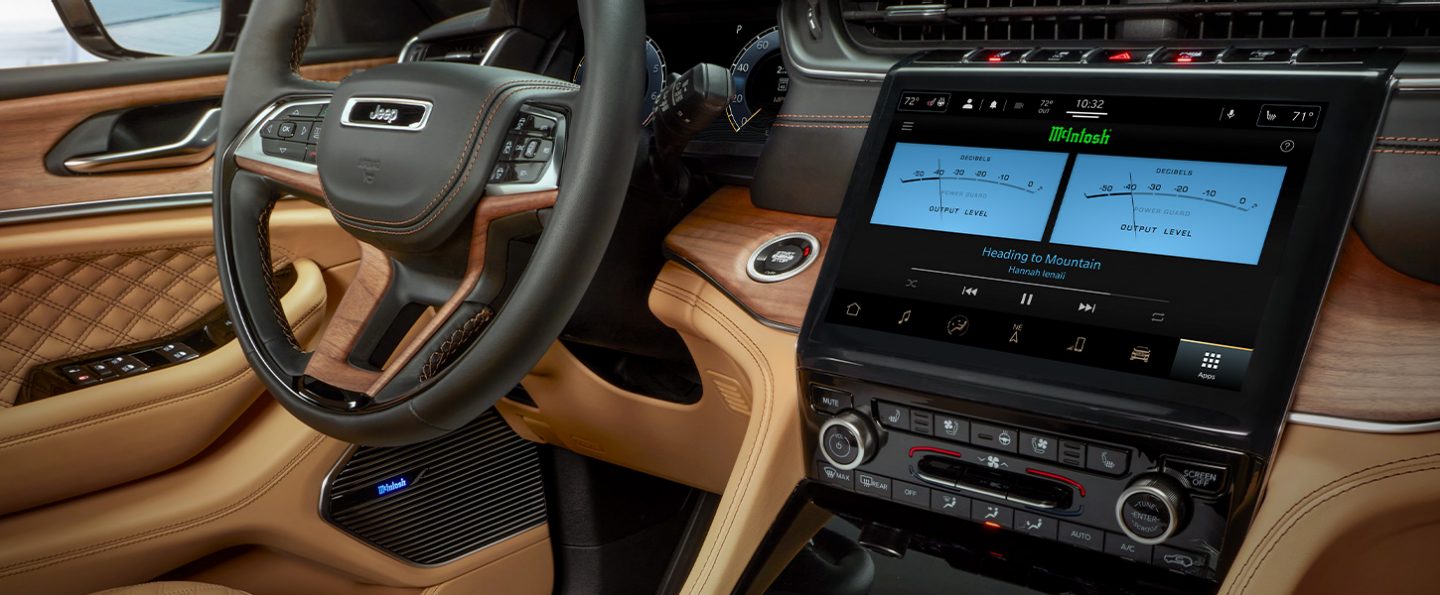 The 10.1-inch touchscreen in the 2021 Jeep Grand Cherokee L Summit Reserve, displaying the decibel level of the McIntosh speakers.