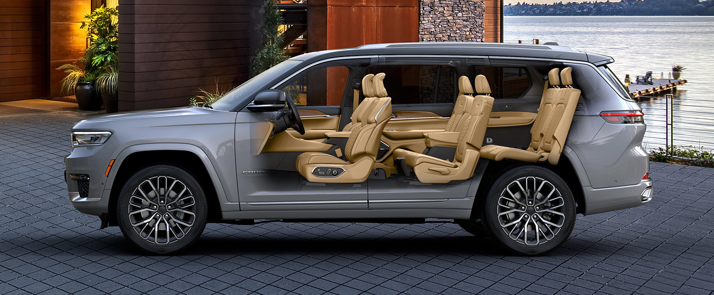 A slider that, begins with an exterior profile view of the three-row 2023 Jeep Grand Cherokee and when pulled back, reveals an interior view of all three rows of seats inside.