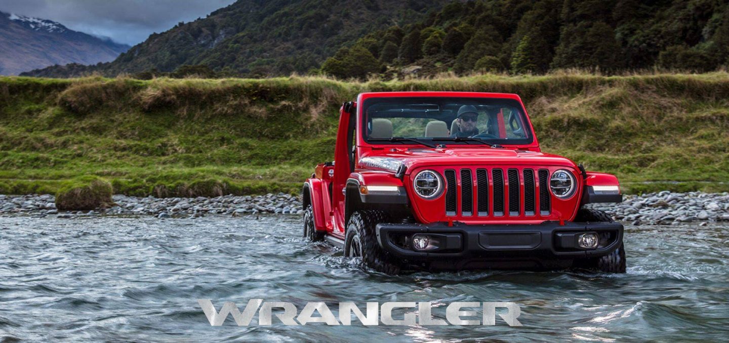 The 2023 Jeep Wrangler Rubicon travelling through water