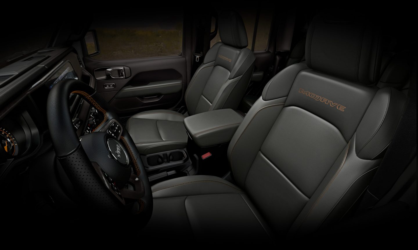 The front seats in the 2024 Jeep Gladiator Mojave.